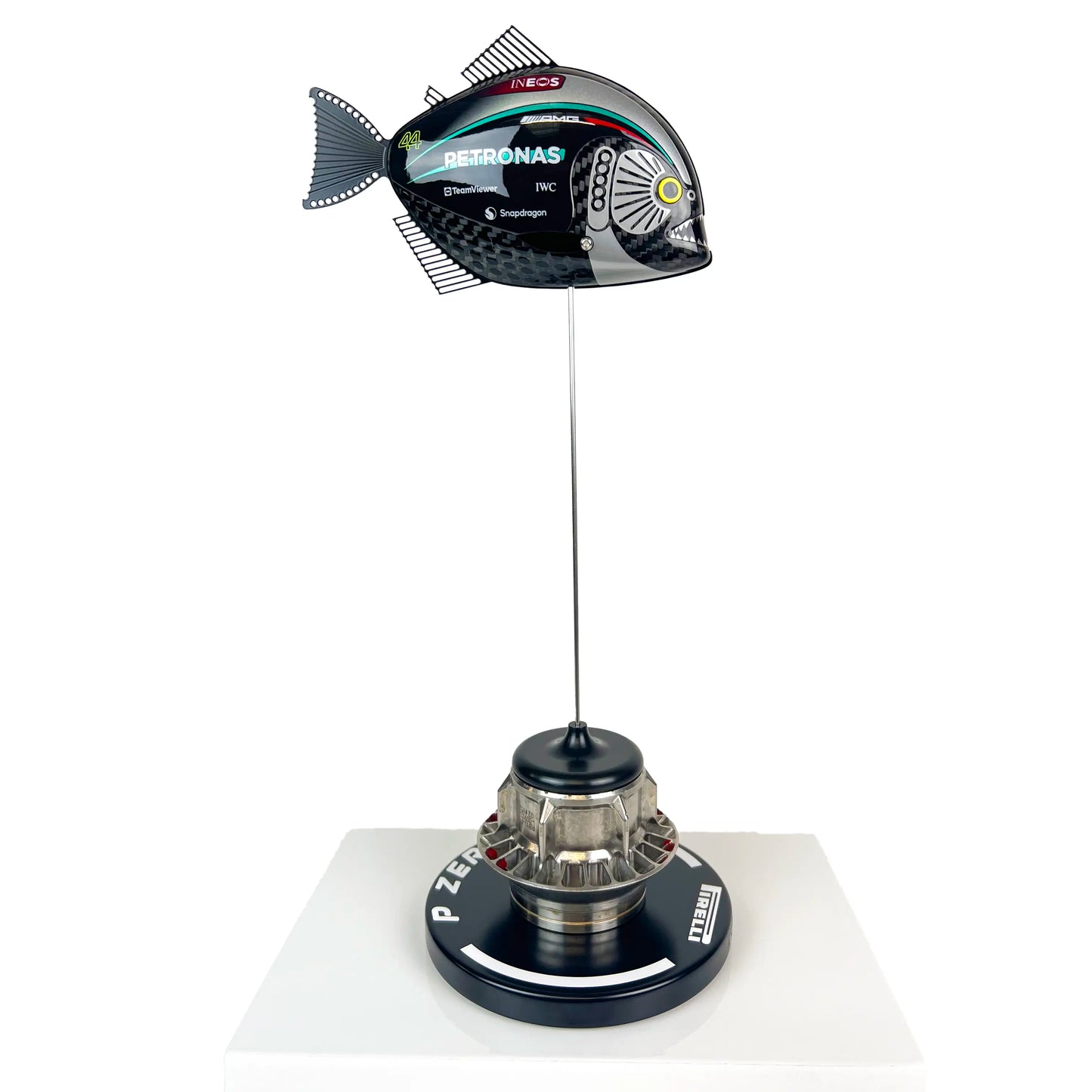 Carbon Fibre Piranha Fish with 2024 Mercedes F1 Livery on white Pirelli base with F1 wheel nut