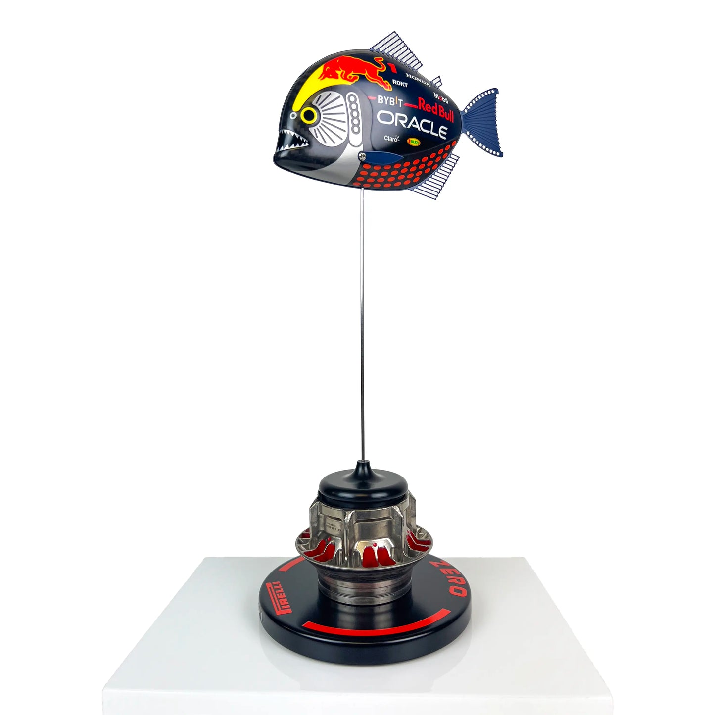 Carbon Fibre Piranha Fish with 2024 RedBull Inspired F1 Livery on red Pirelli base with F1 wheel nut