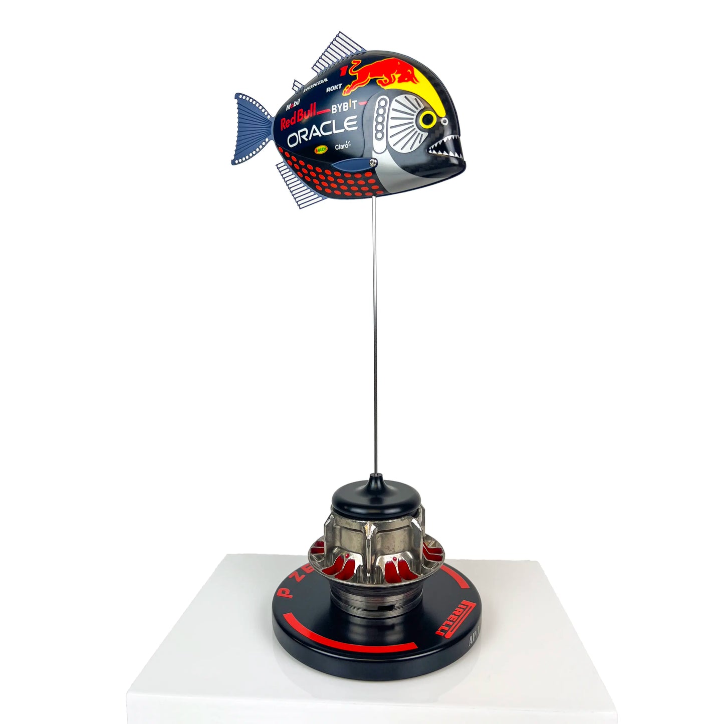 Carbon Fibre Piranha Fish with 2024 RedBull Inspired F1 Livery on red Pirelli base with F1 wheel nut