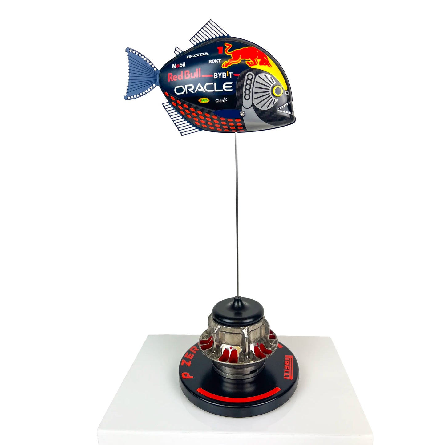 Carbon Fibre Piranha Fish with 2024 RedBull Inspired F1 Livery on red Pirelli base with F1 wheel nut