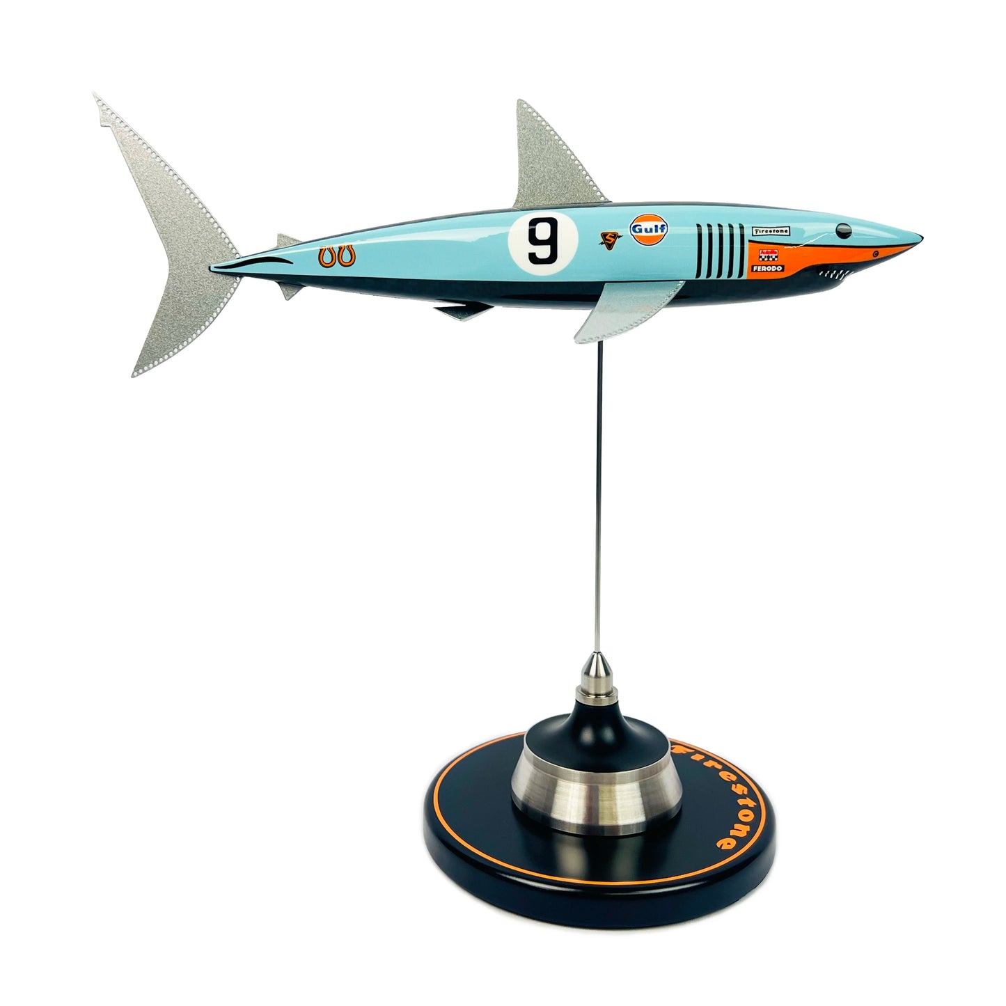 Carbon fibre shark with Gulf Ford GT40 Livery on a black base with Firestone Logo.
