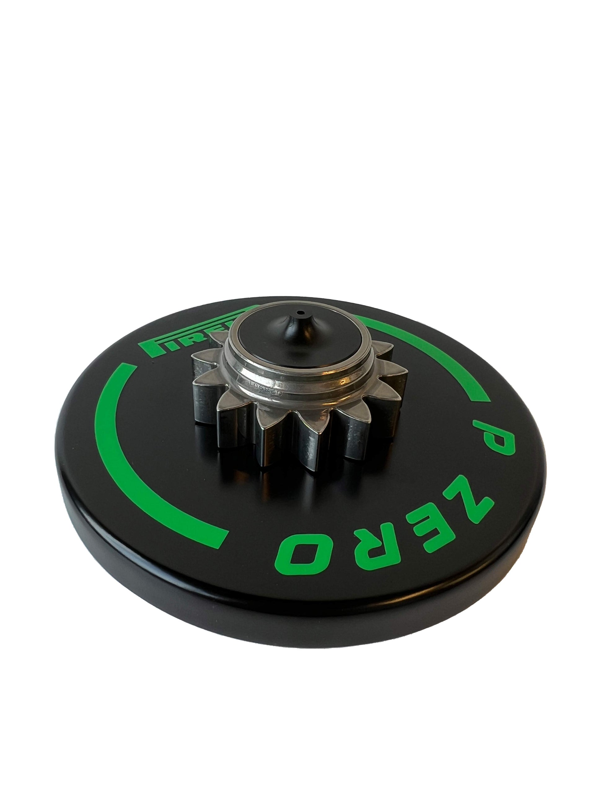 Black base with F1 gear and green Pirelli logo