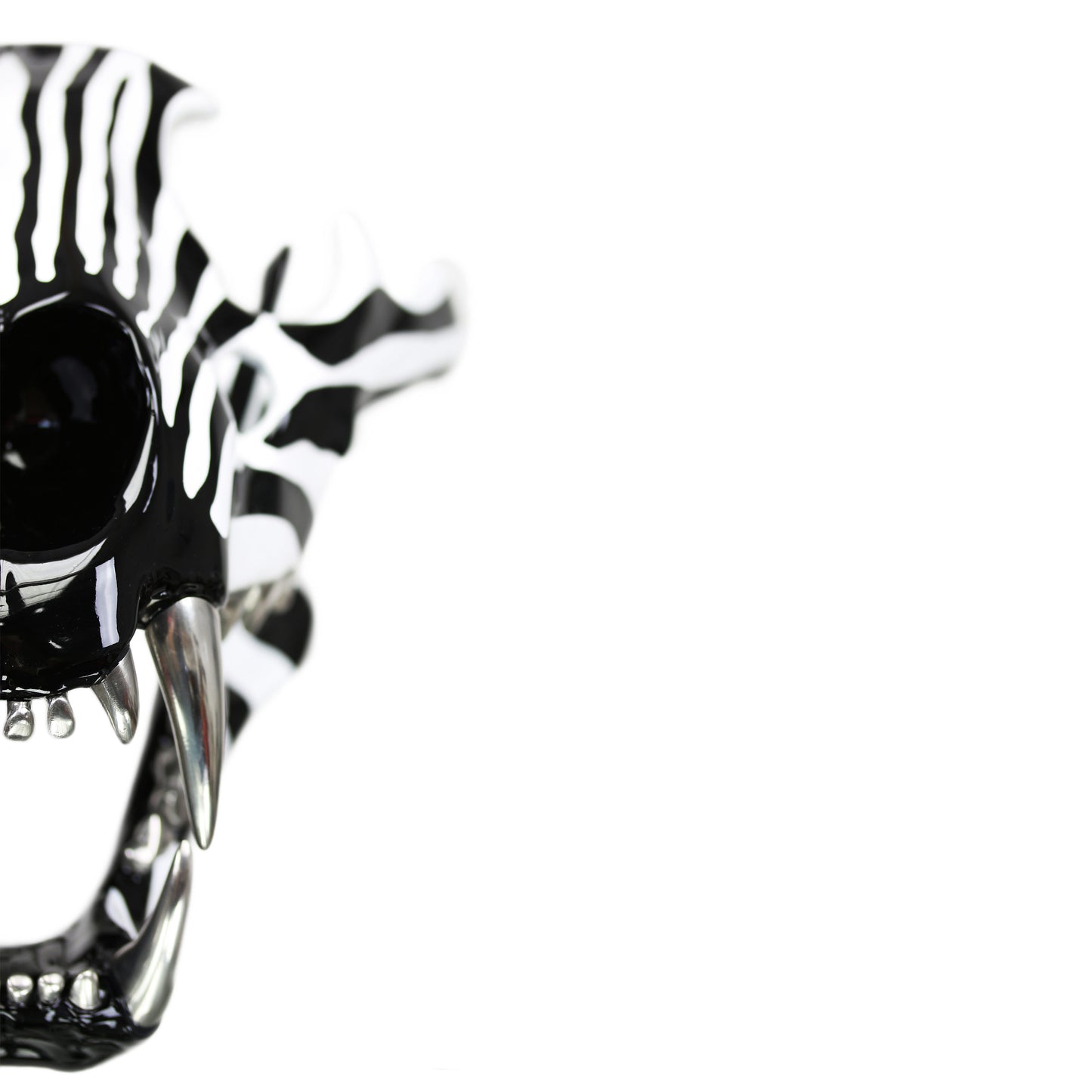 Lion skull with Zebra pattern on a granite base