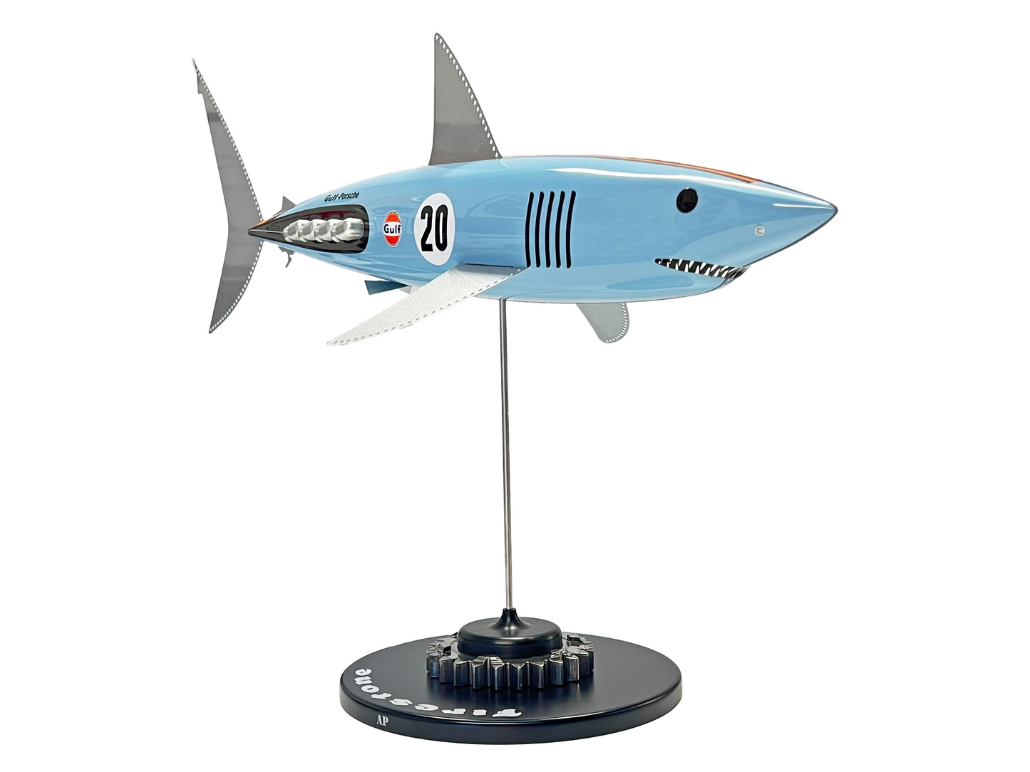 Carbon fibre Mako shark sculpture with Gulf Porsche Livery on a black base with F1 gear