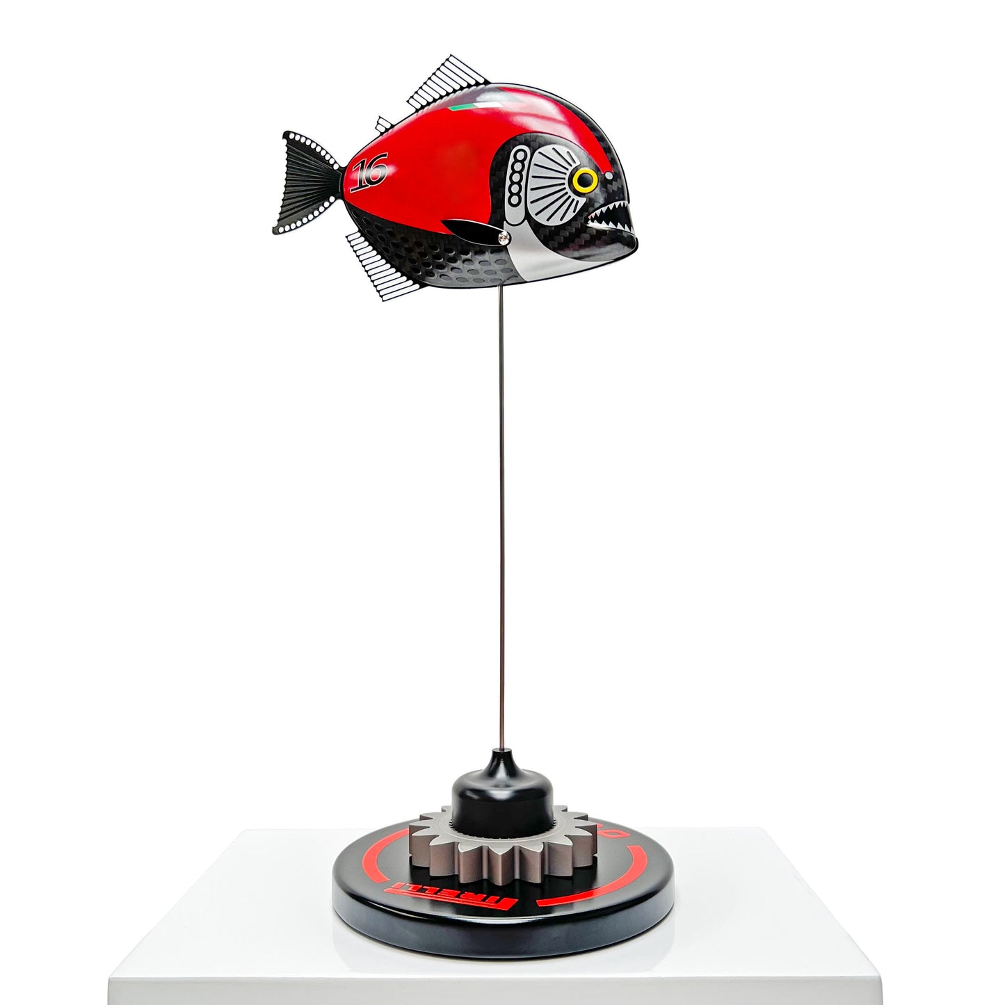 Carbon fibre Piranha fish with Ferrari F1 livery on a black base with F1 gear