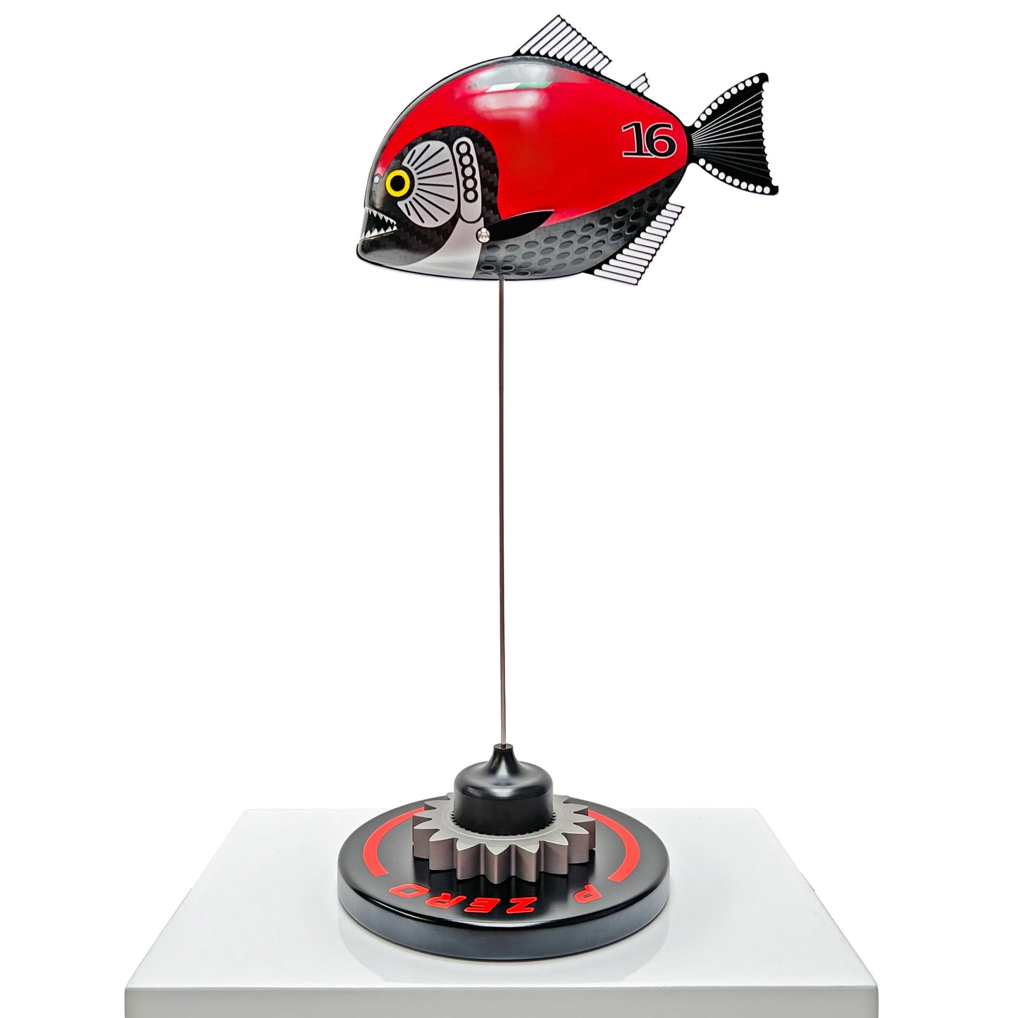 Carbon fibre Piranha fish with Ferrari F1 livery on a black base with F1 gear