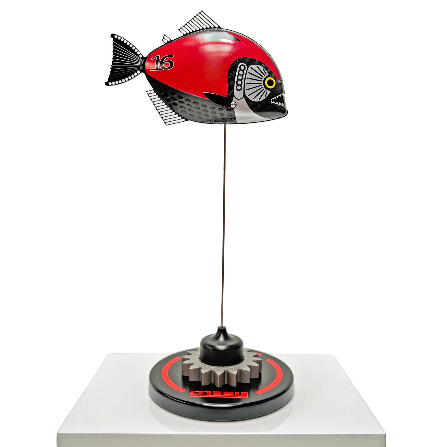 Carbon fibre Piranha fish with Ferrari F1 livery on a black base with F1 gear