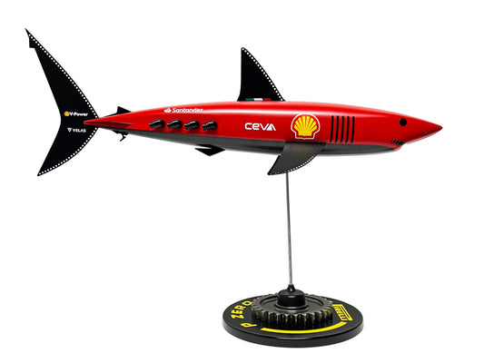 Carbon fibre Mako Shark with Ferrari F1 livery on a black base with F1 gear