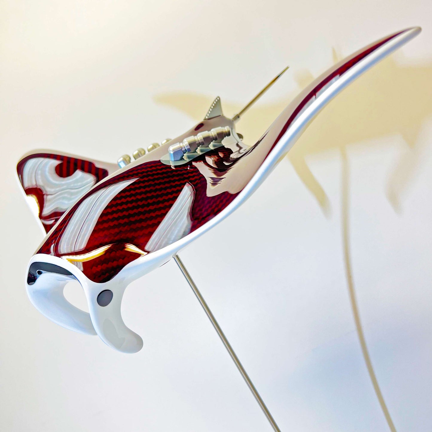 Carbon fibre red tinted Manta ray