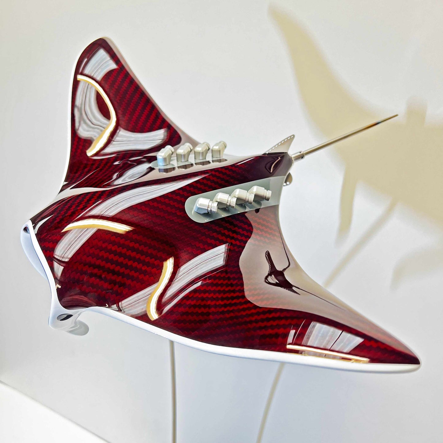 Carbon fibre red tinted Manta ray