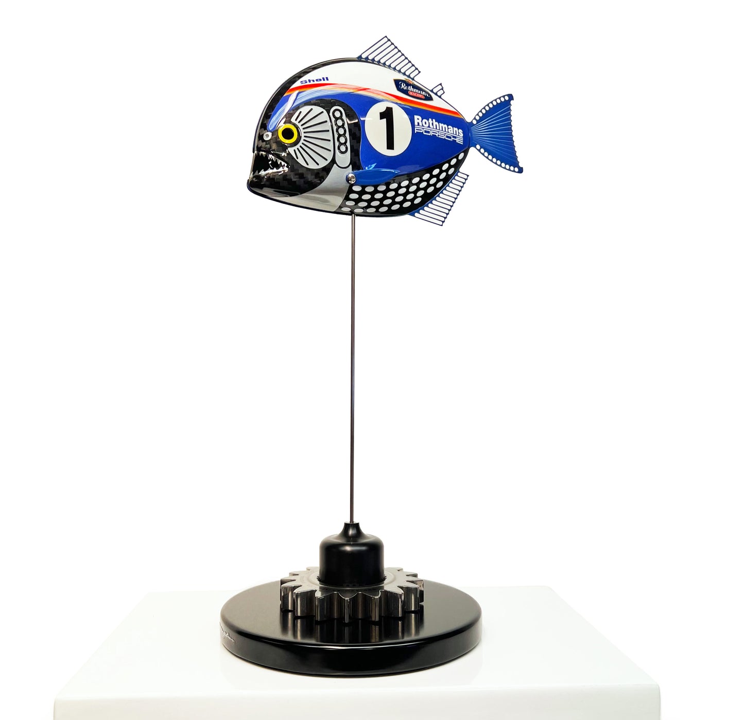 Carbon fibre Piranha with Rothmans Porsche livery on a black base with F1 gear