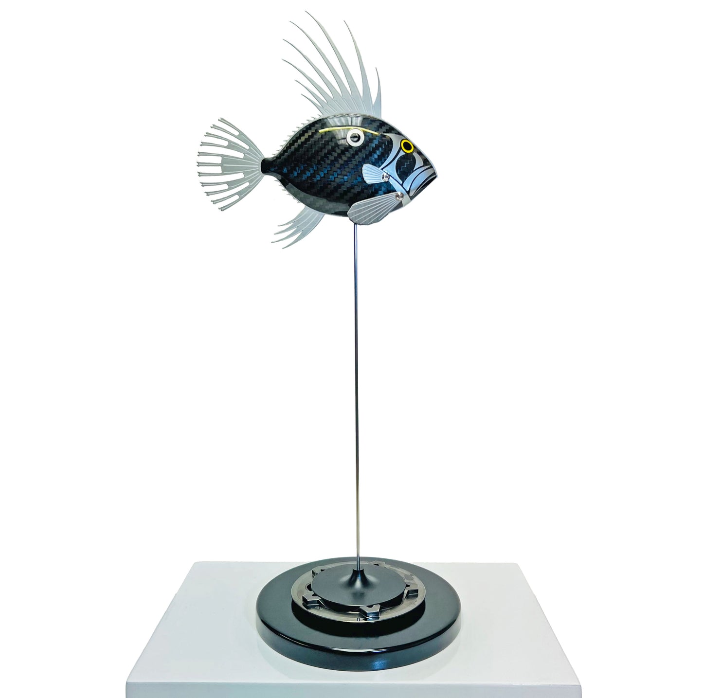 Carbon fibre baby dory sculpture on a black base