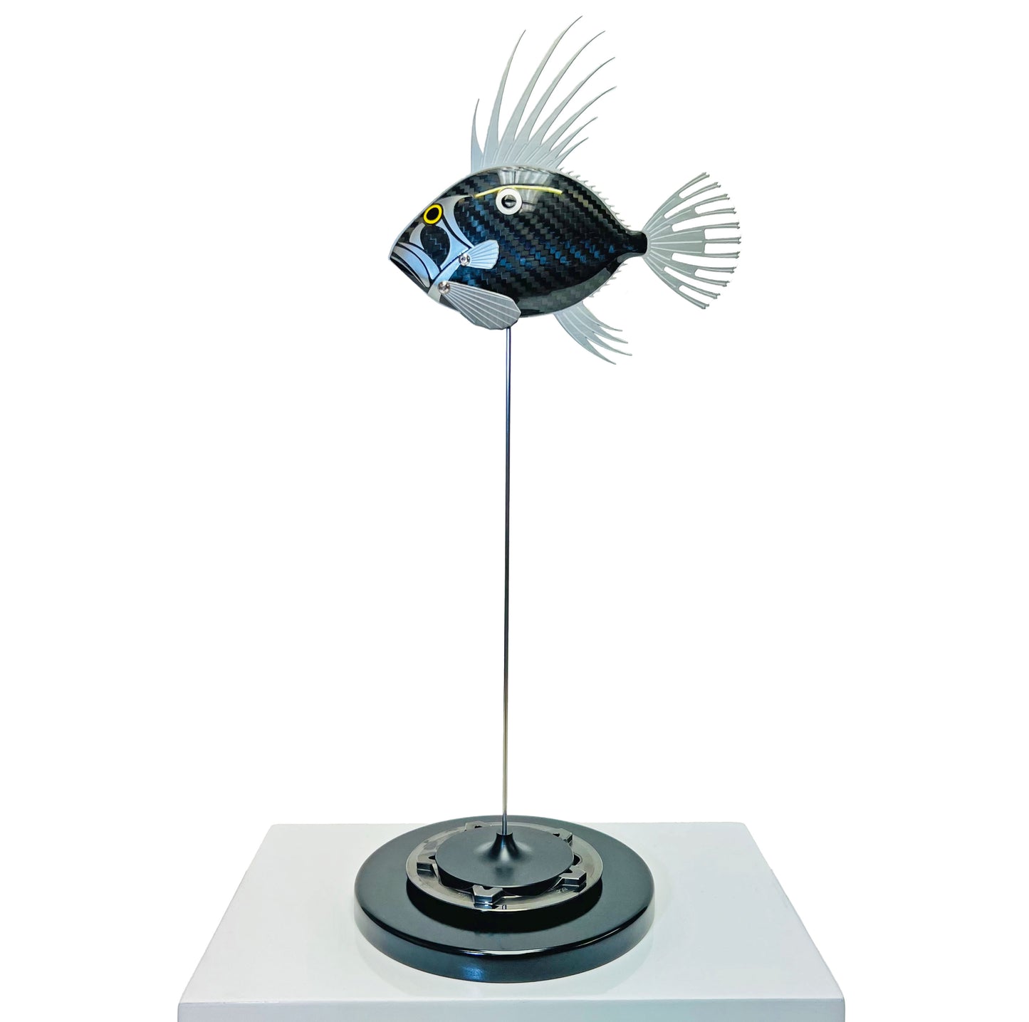 Carbon fibre baby dory sculpture on a black base