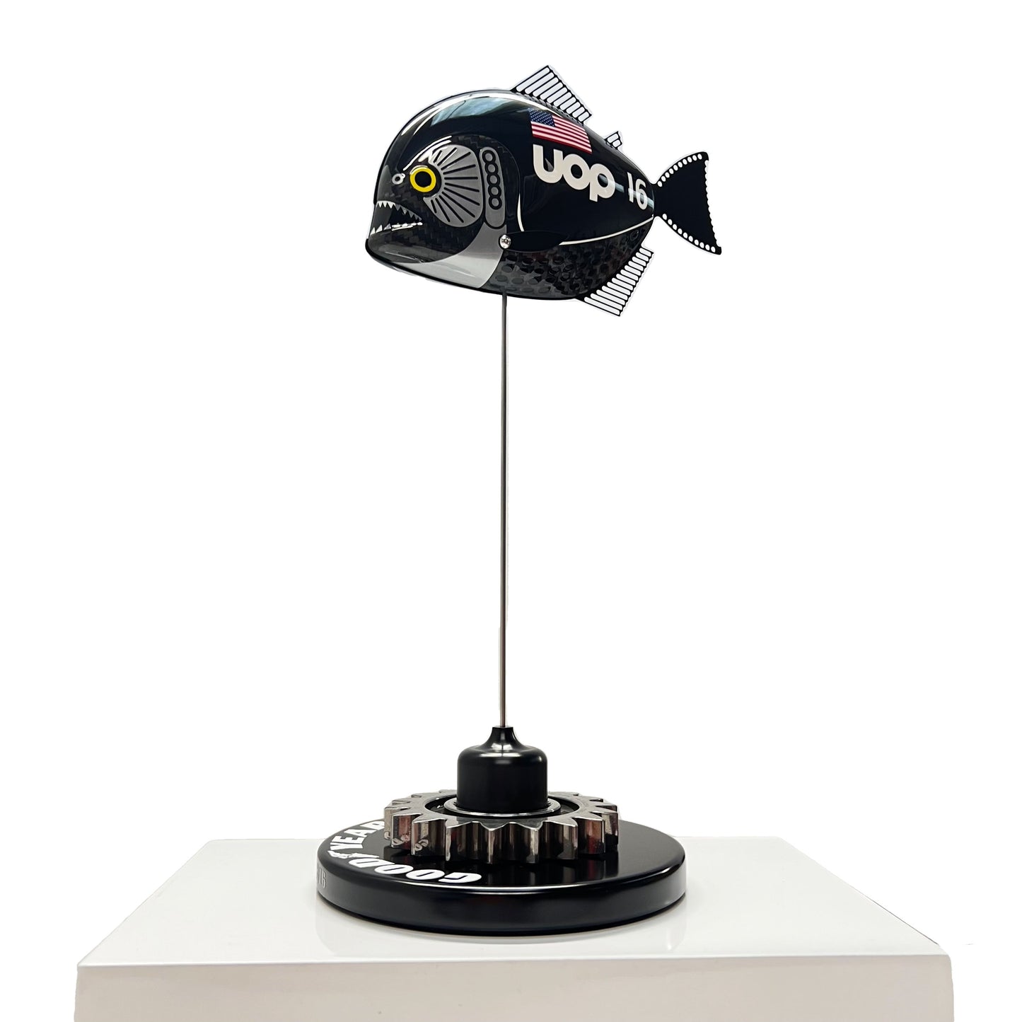 Carbon fibre Piranha fish with UOP livery on a black base with F1 gear