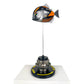 Carbon Fibre Piranha Fish with 2024 McLaren F1 Livery on yellow Pirelli base with F1 wheel nut
