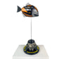 Carbon Fibre Piranha Fish with 2024 McLaren F1 Livery on yellow Pirelli base with F1 wheel nut