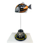 Carbon Fibre Piranha Fish with 2024 McLaren F1 Livery on yellow Pirelli base with F1 wheel nut