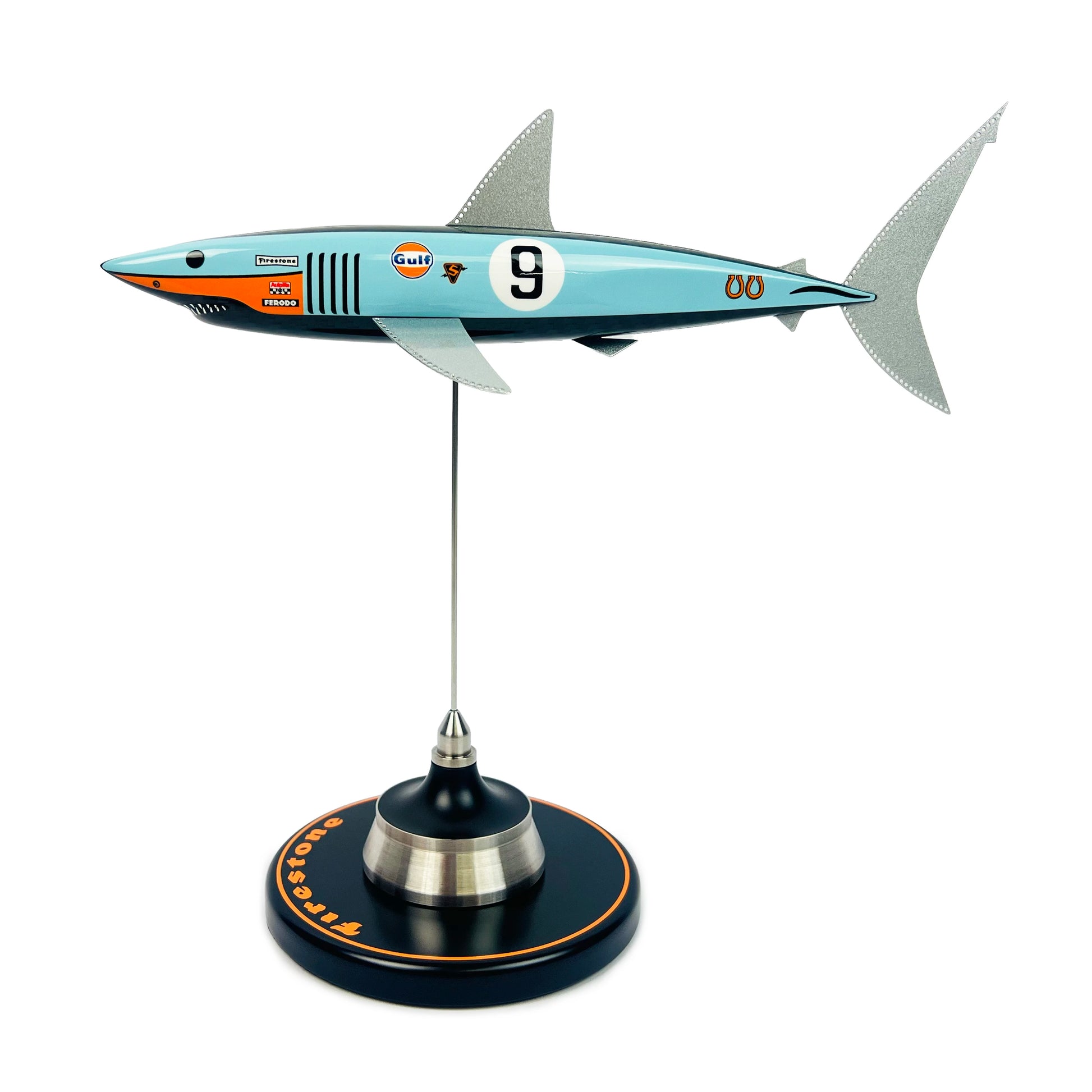 Carbon fibre shark with Gulf Ford GT40 Livery on a black base with Firestone Logo.