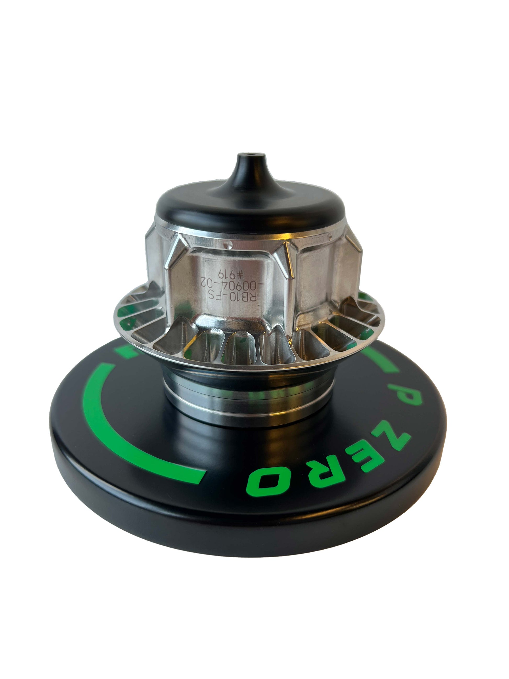 F1 wheel nut on a black base with green Pirelli logo