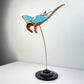 Gulf Ford inspired carbon fibre manta ray sculpture on a stand with white background