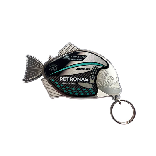 Fish-shaped keychain with Petronas branding on a white background