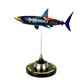Carbon Fibre Sculpture of a shark with RedBull racing livery on a stand against a white background