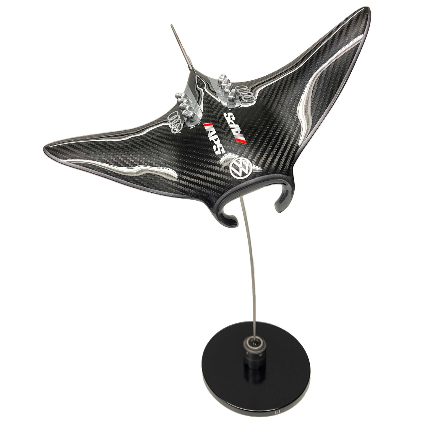 Carbon fibre manta ray sculpture with custom APS livery on a black base and F1 part
