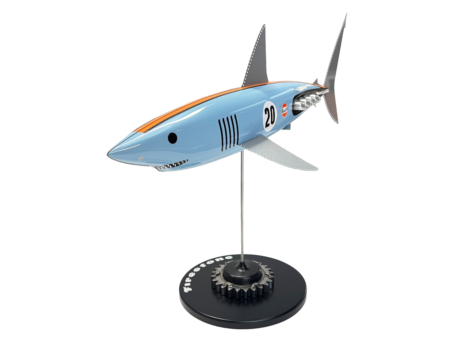 Carbon fibre Mako shark sculpture with Gulf Porsche Livery on a black base with F1 gear