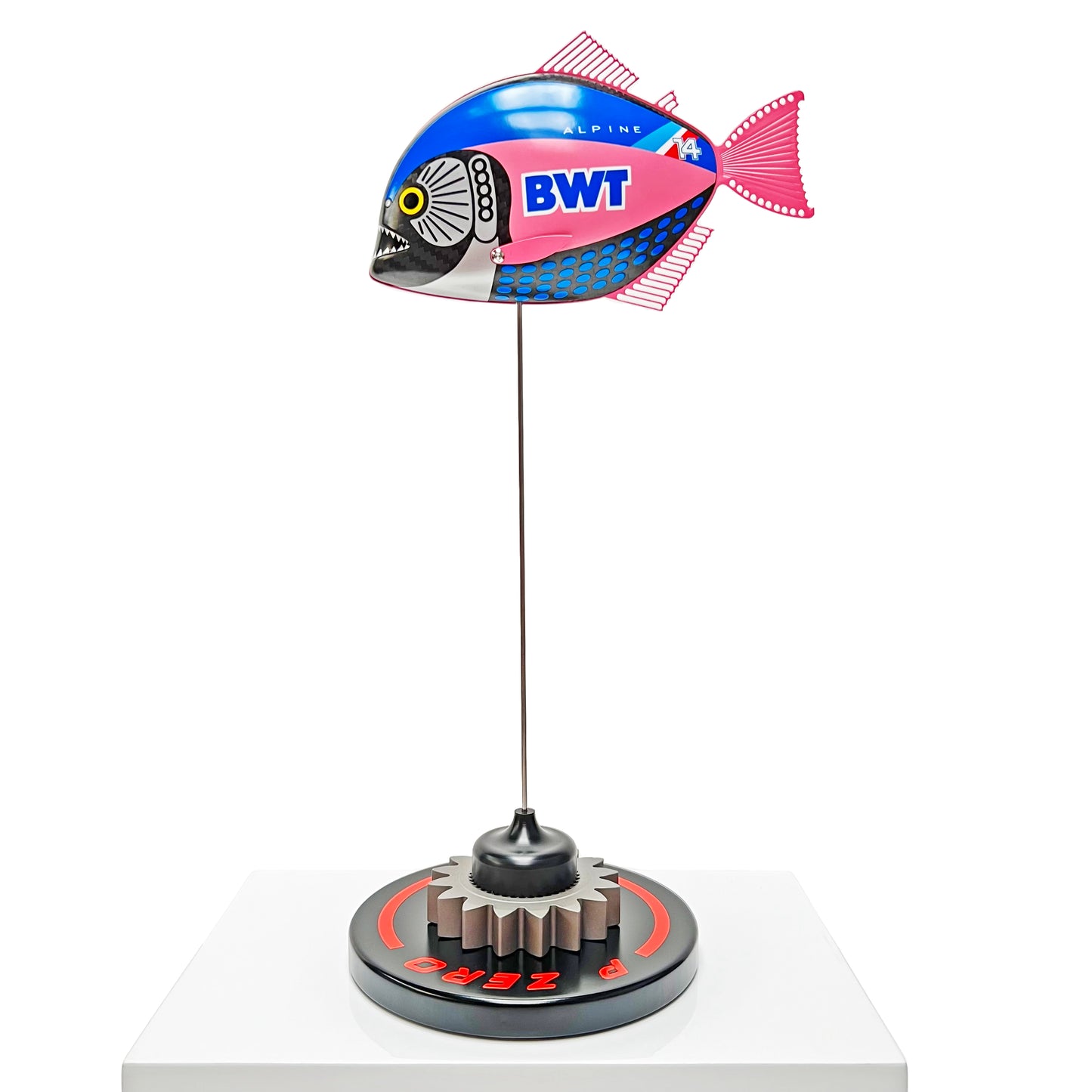 Carbon fibre baby piranha sculpture with Alpine F1 livery on a black base with F1 gear