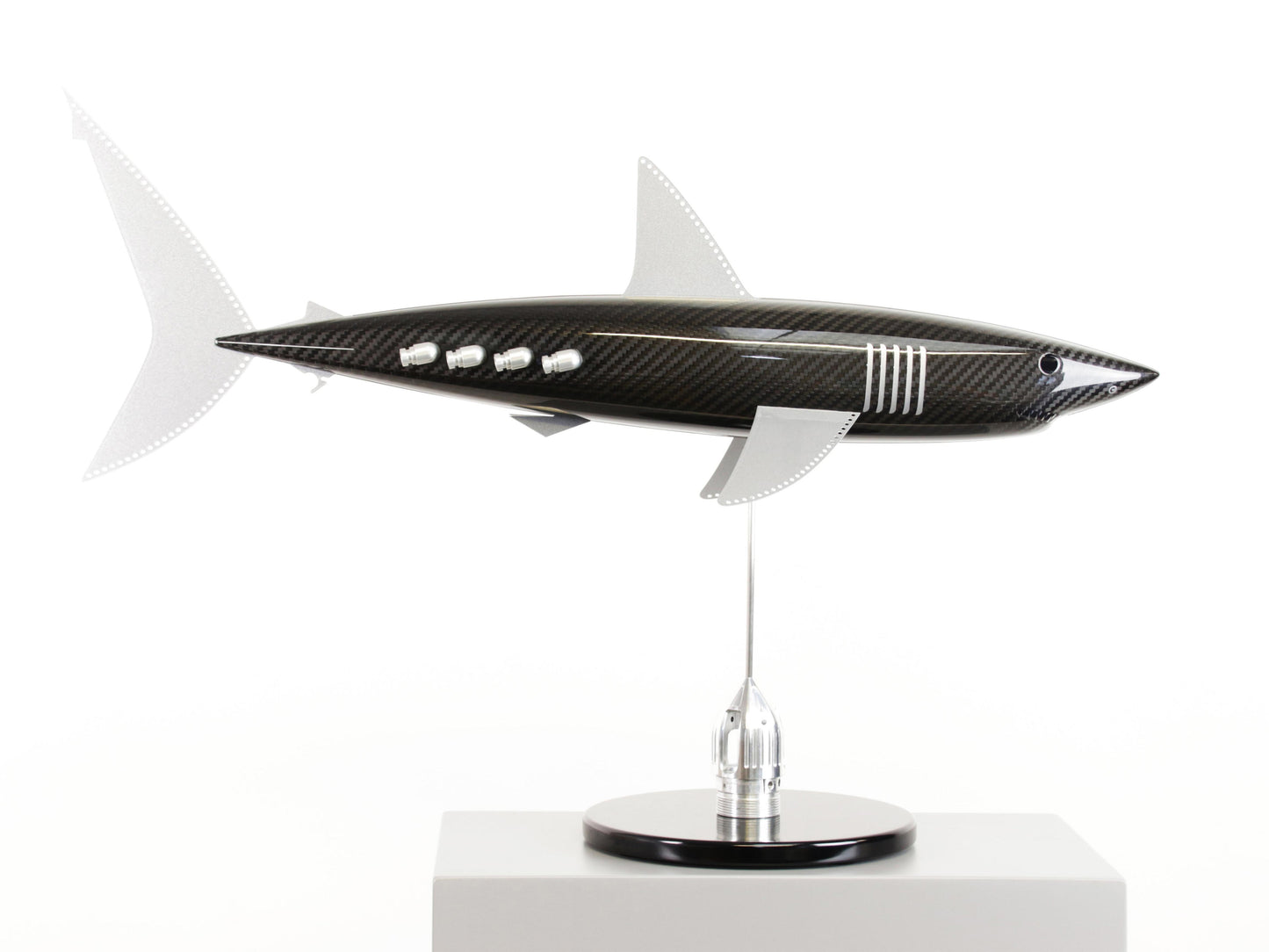 Carbon fibre Mako Shark sculpture on a black base with F1 parts