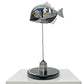 Carbon fibre Piranha sculpture with Martini Porsche livery on a black base with F1 parts