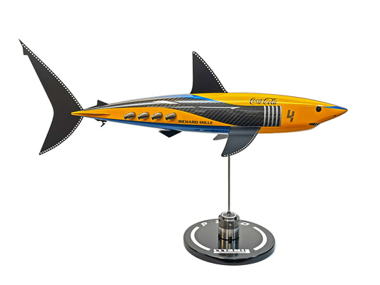 Carbon fibre Mako Shark pup with McLaren livery and black fins on a black base with F1 parts