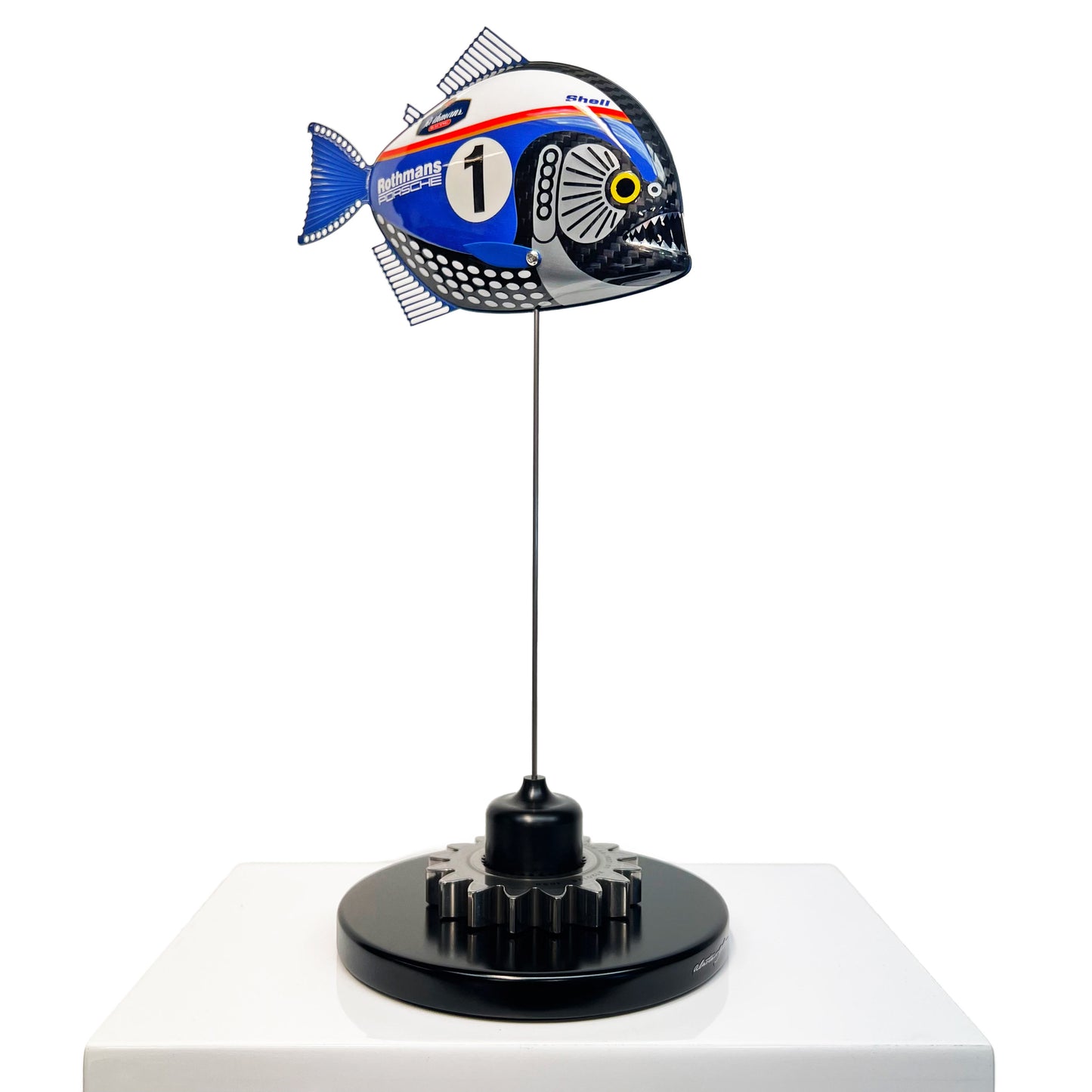 Carbon fibre Piranha with Rothmans Porsche livery on a black base with F1 gear