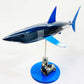 Blue tinted carbon fibre Mako Shark Pup with blue fins and blue base