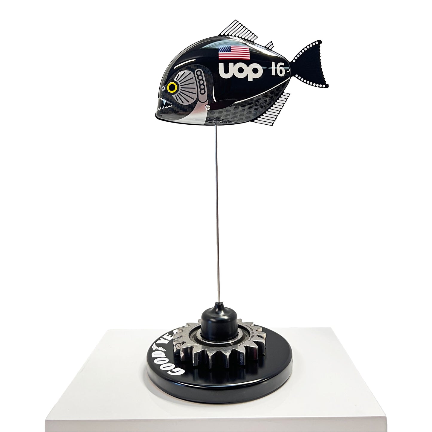 Carbon fibre Piranha fish with UOP livery on a black base with F1 gear